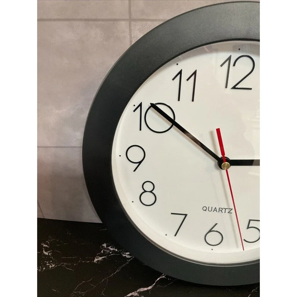 Universal Wall Clock 9 3/4 In Diameter Black Case